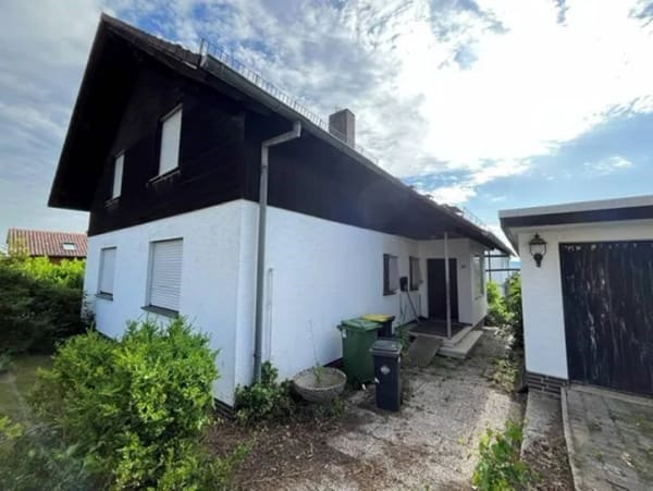Immobilie in Fuldabrück - Wohnhaus mit 2 Wohnungen und Garage - Bild 0