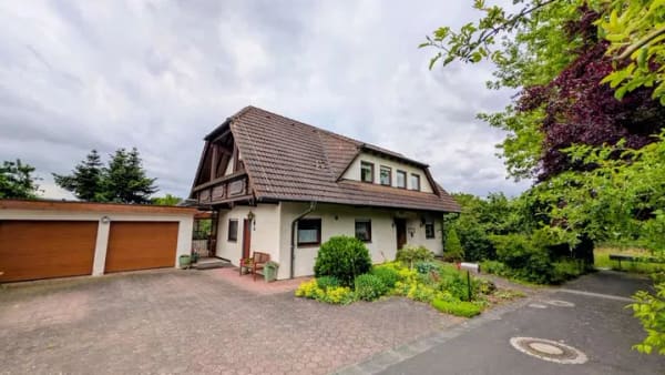 Immobilie in Euerdorf - Freistehendes Einfamilienhaus mit Einliegerwohnung in Euerdorf - Bild 1