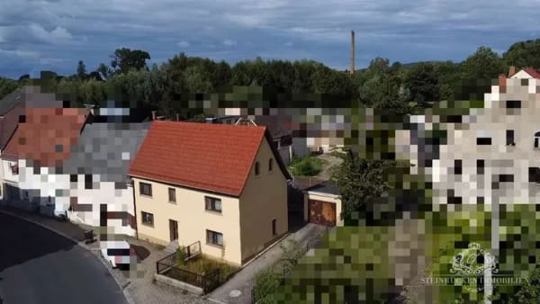 Immobilie in Lichtenberg - Ihr neues Zuhause: Reihenendhaus in Pulsnitz mit viel Potenzial - Bild 0