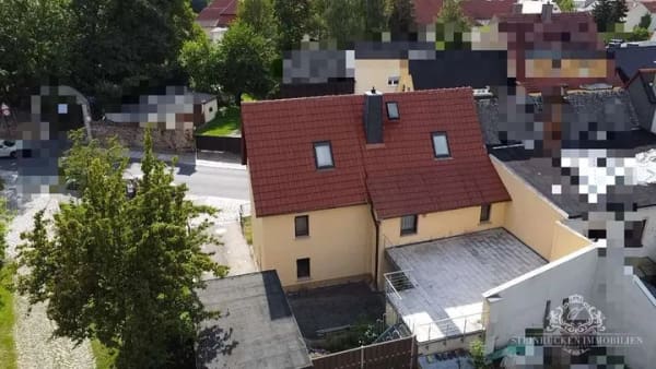 Immobilie in Lichtenberg - Ihr neues Zuhause: Reihenendhaus in Pulsnitz mit viel Potenzial - Bild 2
