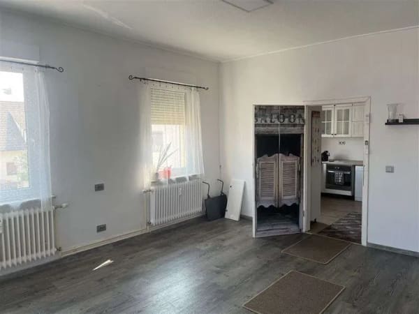 Immobilie in Iffezheim - Mehr Wohnqualität als der erste Eindruck vermuten lässt – helle 2-Zimmer-Wohnung mit Charme - Bild 1