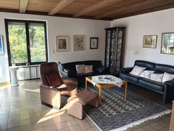 Immobilie in Karlstein am Main - Vielseitige DHH mit Wintergarten, Einliegeroption und markanter Architektur in ruhiger Wohnlage - Bild 1