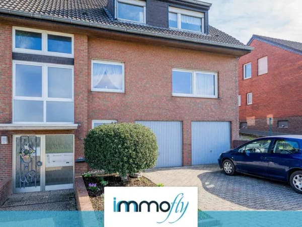 Immobilie in Jüchen - Paket-Ensemble für Anleger: 2 vermietete Eigentumswohnungen mit Garage und Garten! - Bild 0