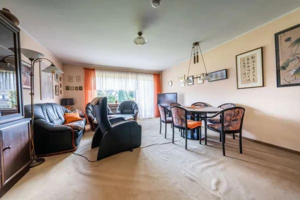 Immobilie in Jüchen - Paket-Ensemble für Anleger: 2 vermietete Eigentumswohnungen mit Garage und Garten! - Bild 1
