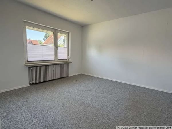 Immobilie in Rastede - Großzügiges Ein-/Zweifamilienhaus mit vielseitigen Nutzungsmöglichkeiten in attraktiver Wohnlage - Bild 3