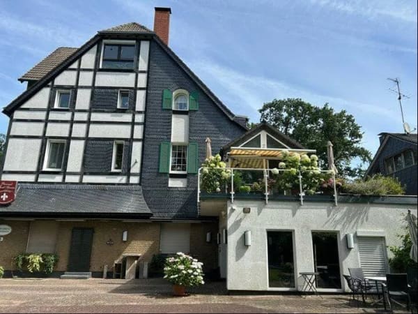 Immobilie in Heiligenhaus - Mehrfamilienhaus mit 4 Wohnungen und einer Gaststätte als Gewerbeeinheit! - Bild 1
