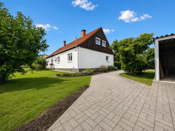 Immobilie in Olbersdorf -  Doppelhaushälfte mit großem Grundstück, zwei Garagen und neuer Heizung in Olbersdorf - Bild 1