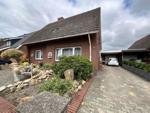 Immobilie in Geeste - Familienglück mit Gartenparadies - 
Einfamilienhaus mit Einliegerwohnung in Geeste-Dalum 
 - Bild 1