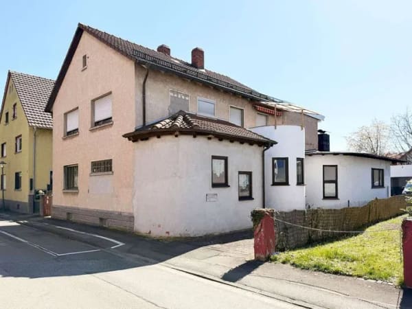 Immobilie in Bürstadt - Großzügige Erdgeschosswohnung mit Terrasse, Garten und viel Potenzial in ruhiger Lage von Bürstadt - Bild 1