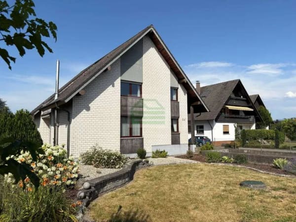Immobilie in Rheinau - Wohnen mit Charakter – Einfamilienhaus mit außergewöhnlicher Architektur und Garten - Bild 1