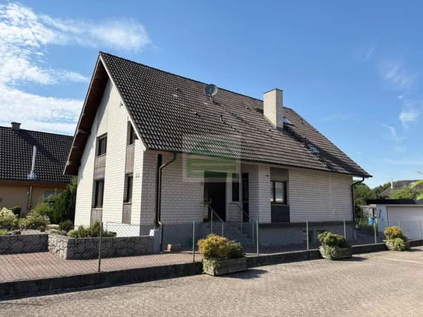Immobilie in Rheinau - Wohnen mit Charakter – Einfamilienhaus mit außergewöhnlicher Architektur und Garten - Bild 2