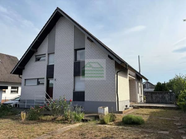 Immobilie in Rheinau - Wohnen mit Charakter – Einfamilienhaus mit außergewöhnlicher Architektur und Garten - Bild 3