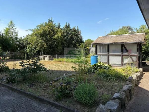 Immobilie in Rheinau - Wohnen mit Charakter – Einfamilienhaus mit außergewöhnlicher Architektur und Garten - Bild 4