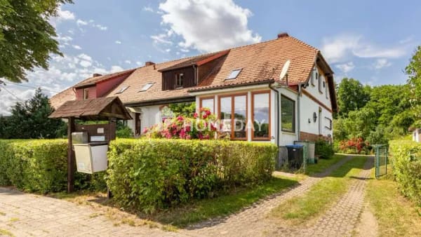 Immobilie in Hoppenrade - Doppelhaushälfte mit Einliegerwohnung und über 2.200 Quadratmetern Grundstück - Bild 0