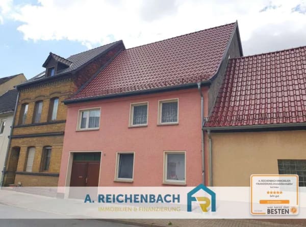 Immobilie in Gräfenhainichen - Reihenmittelhaus mit großem Grundstück, Nebengebäuden und Ausbaupotenzial in Gräfenhainichen - Bild 0