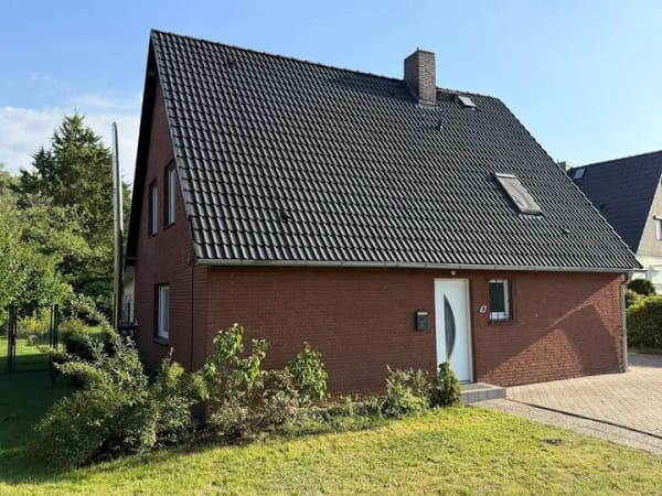 Immobilie in Moorrege - Modernisiertes Einfamilienhaus mit großzügigem Anbau und Südgarten - Bild 0