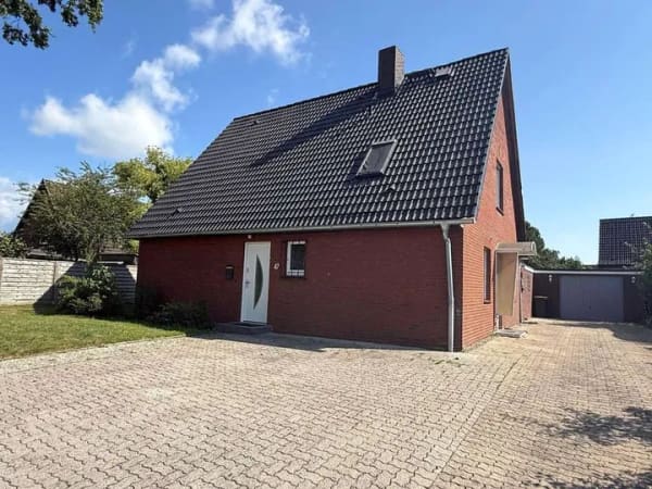 Immobilie in Moorrege - Modernisiertes Einfamilienhaus mit großzügigem Anbau und Südgarten - Bild 1