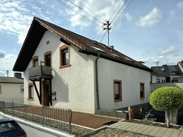 Immobilie in Schmelz - Mehrfamilienhaus in Schmelz (Bettingen) - Bild 1