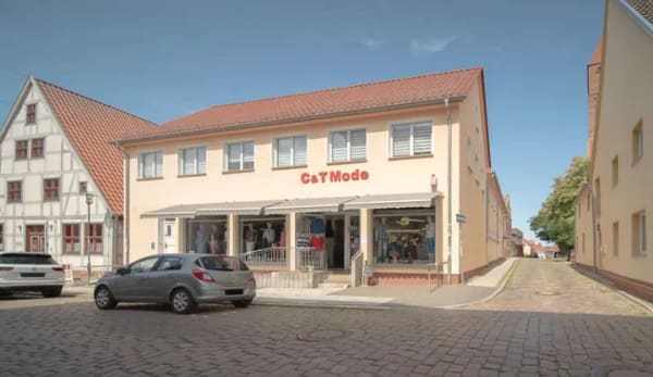 Immobilie in Grimmen - Mehrfamilienhaus mit Gewerbeeinheit im Zentrum - Bild 0