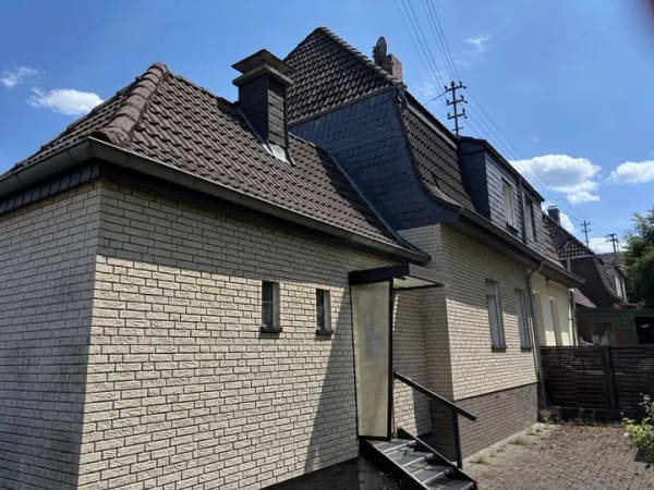 Immobilie in Wissen - Charmante Doppelhaushälfte mit großem Garten und ausgebautem Dachgeschoss in Wissen - Bild 1