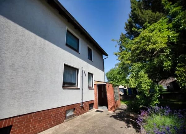 Immobilie in Holle - Teilvermietetes Zweifamilienhaus mit großem Garten - Bild 0