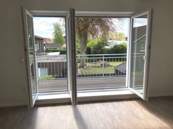 Immobilie in Löningen - Top-Eigentumswohnung mit Balkon! Blick ins Grüne! Gepflegte und geräumige 2 ZKB mit EBK, HWR und CARPORT! - Bild 3