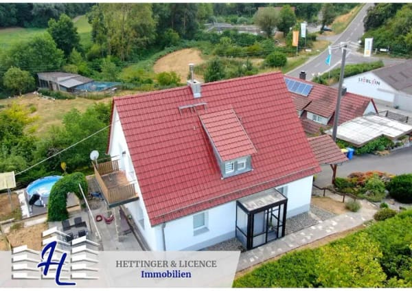 Immobilie in Aub - Modernes Einfamilienhaus mit separatem Nebengebäude in Aub - Wohnen & bis zu 14.600 € Mieteinnahmen jährlich möglich! - Bild 0