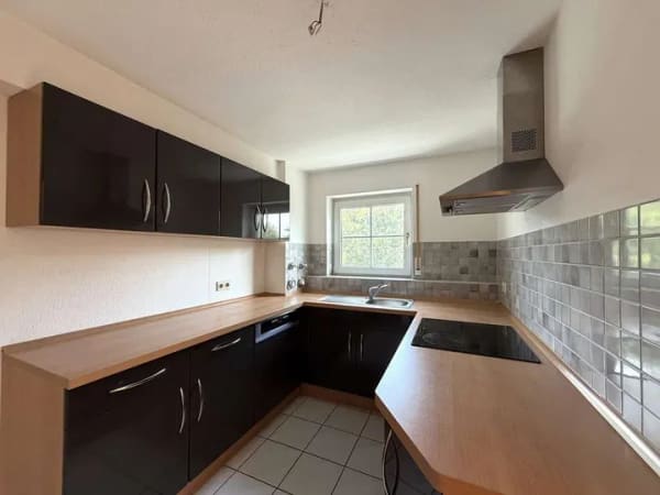 Immobilie in Burgrieden - Großzügige 2-Zimmer-Wohnung mit sonnigem Balkon - Bild 2