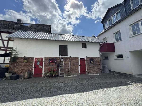 Immobilie in Nastätten - Schöne Maisonettewohnung (100 m²) mit großzügigem Balkon und Blick ins Grüne - Bild 0