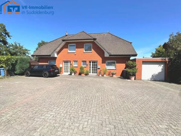 Immobilie in Garrel - Zentrumsnah in Garrel: Gepflegtes Doppelhaus mit Garage und PKW-Stellplätzen! - Bild 0