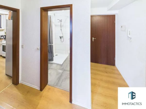 Immobilie in Ober-Olm - Zuverlässig vermietete Souterrainwohnung mit Stellplatz & saniertem Bad - Attraktive Kapitalanlage - Bild 1