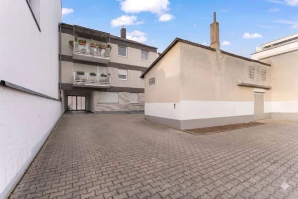 Immobilie in Pulheim - Mehrfamilienhaus mit Gewerbeeinheit - Bild 1