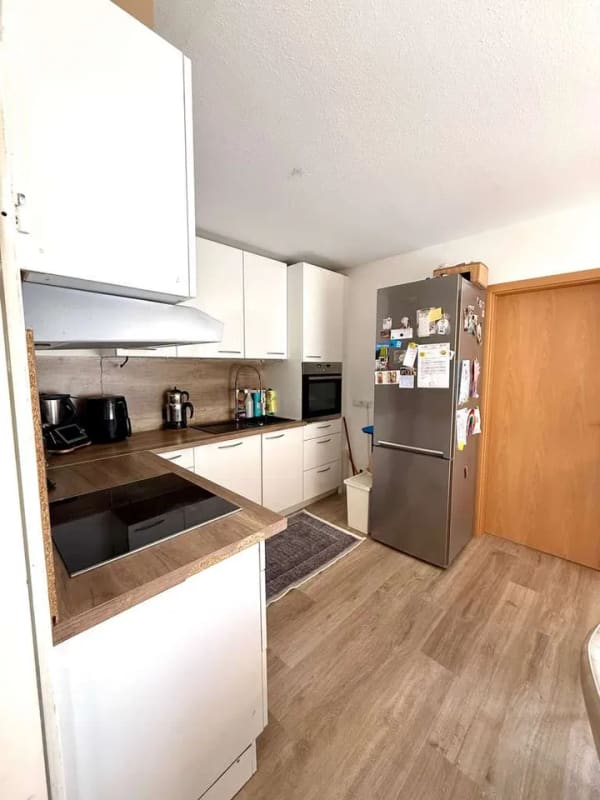 Immobilie in Neuenrade - Modernisierte 3-Zimmer-Wohnung mit Einbauküche, Balkon & stufenlosem Eingang! - Bild 2