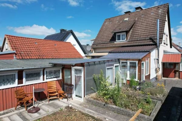 Immobilie in Lauenförde - Gepflegtes Einfamilienhaus mit Garage und Anbau in Lauenförde - Bild 1