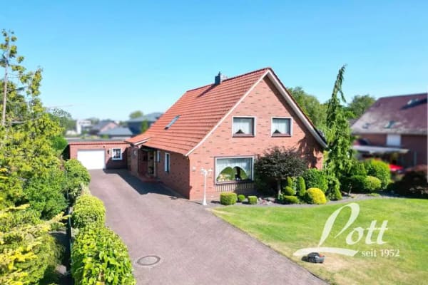 Immobilie in Apen - ++ Attraktives Einfamilienhaus mit mögl. Einliegerwohnung in beliebter Kanallage in Augustfehn ++ - Bild 0