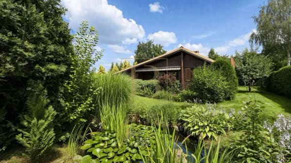 Immobilie in Suhlendorf - Traumhaftes Wohnen im Grünen: Gemütlicher Blockhaus-Bungalow mit Naturparadies in Suhlendorf - Bild 0