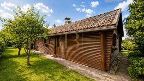 Immobilie in Suhlendorf - Traumhaftes Wohnen im Grünen: Gemütlicher Blockhaus-Bungalow mit Naturparadies in Suhlendorf - Bild 1