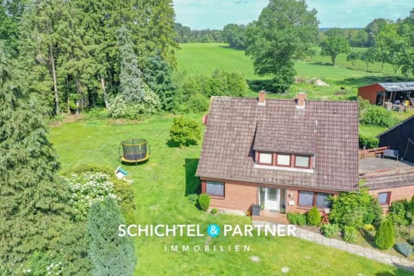 Immobilie in Vollersode - Giehlermoor | Vermietetes Einfamilienhaus mit Einbauküche und Garten - Bild 0