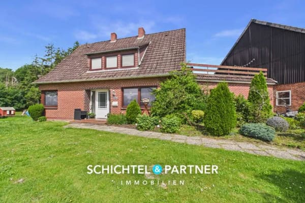 Immobilie in Vollersode - Giehlermoor | Vermietetes Einfamilienhaus mit Einbauküche und Garten - Bild 1