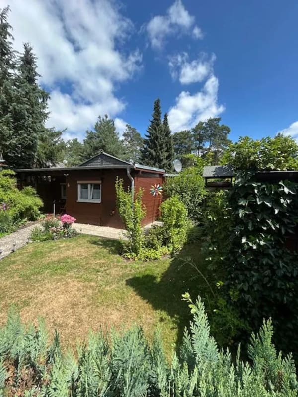 Immobilie in Wesendorf - Wohnen wo andere Urlaub machen - Romantisches Ferienhaus in idyllischer Waldlage am See - Bild 0