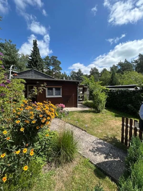Immobilie in Wesendorf - Wohnen wo andere Urlaub machen - Romantisches Ferienhaus in idyllischer Waldlage am See - Bild 2