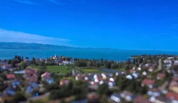 Immobilie in Wasserburg (Bodensee) - Großzügige Doppelhaushälfte mit Potenzial in begehrter Lage von Wasserburg - vielseitig nutzbar! - Bild 1