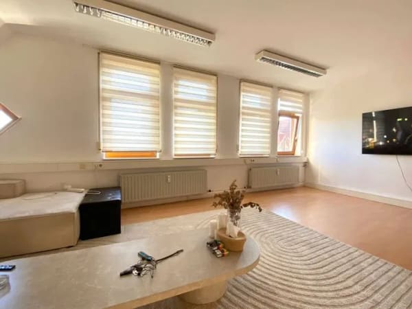 Immobilie in Ilsfeld - Großflächiges Wohn- und Geschäftshaus mit Tiefgarage, freier Gewerbefläche in EG, Wohnen OG und DG - Bild 2