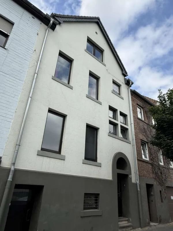Immobilie in Düren - Zweifamilienhaus mit Süd-West-Garten und Sanierungspotenzial in Düren-Rölsdorf - Bild 0