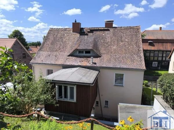 Immobilie in Zittau - Charmantes Einfamilienhaus in Hanglage mit Weitblick, Terrasse & Garage – viel Potenzial zur indi... - Bild 2