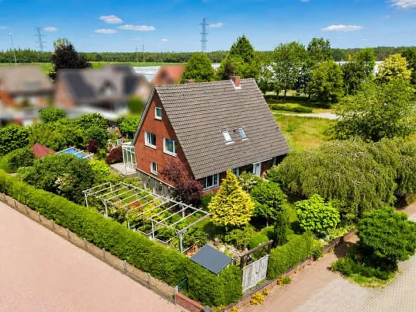 Immobilie in Wietmarschen - Traumhafter Garten trifft auf viel Wohnfläche in Lohne: Einfamilienhaus mit Wintergarten! - Bild 1