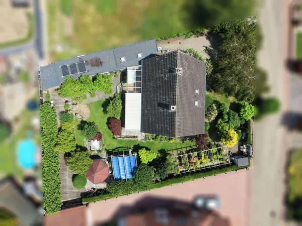 Immobilie in Wietmarschen - Traumhafter Garten trifft auf viel Wohnfläche in Lohne: Einfamilienhaus mit Wintergarten! - Bild 2