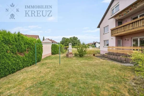 Immobilie in Külsheim - Freistehendes Zweifamilienhaus mit großem Garten und Doppelgarage in Külsheim - Bild 1