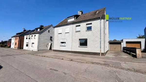 Immobilie in Eschweiler - Zuhause im beliebten Stadtteil Hastenrath – Doppelhaushälfte mit Garage und schönem Garten - Bild 1