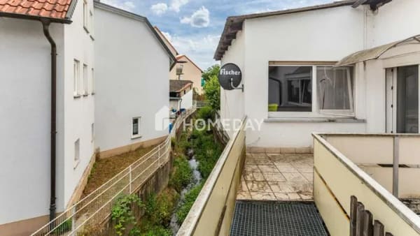 Immobilie in Langgöns - Solide Basis für Ihre Wohnträume: Weitläufiges Haus in attraktiver Ortsmitte - Bild 3